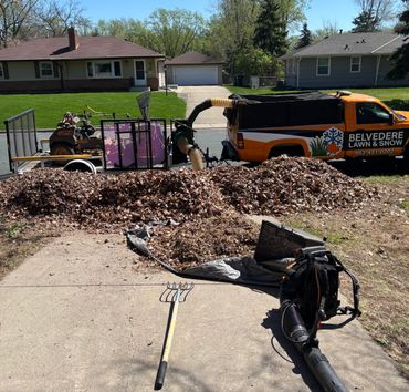 Pile of leaves ready to be sucked up and removed from a customers property