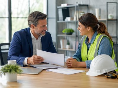 Workers comp insurance consultation with employee and insurance agent