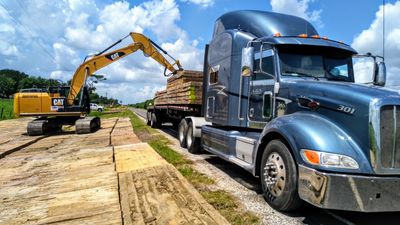 AGY Transport 18 wheeler hauling mats.