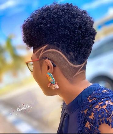 a woman with an afro hairstyle
