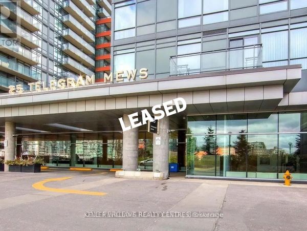 Modern office building with leased space sign.