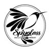 Stylized hummingbird with 'Spyglass' text logo.