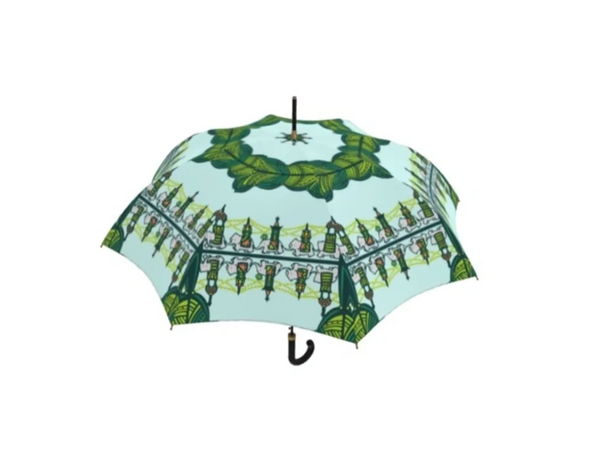 an umbrella using 'A Parade of Elephants' textile design by Keiko Okamoto