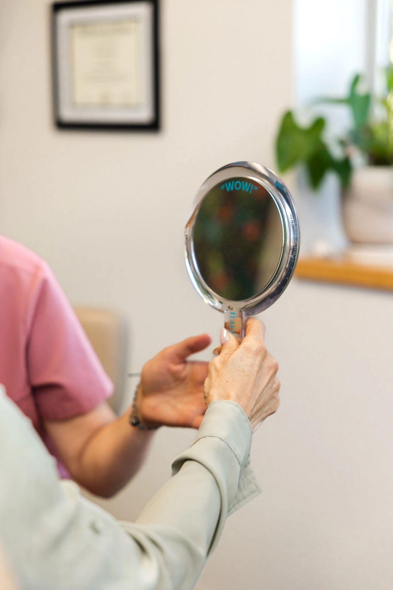 Looking in the mirror at MOTOX skin science in South Portland, Maine