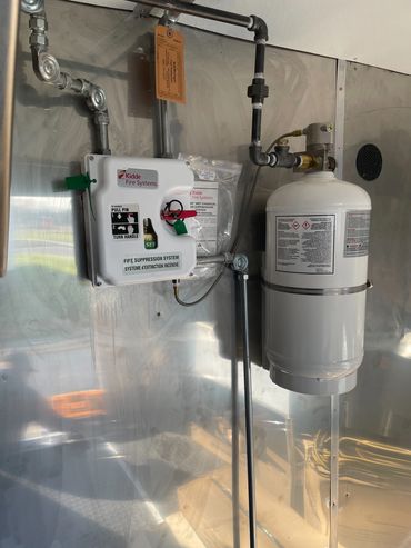 A Fire System installed for a customer in a new food trailer. System was supplied by the customer. 