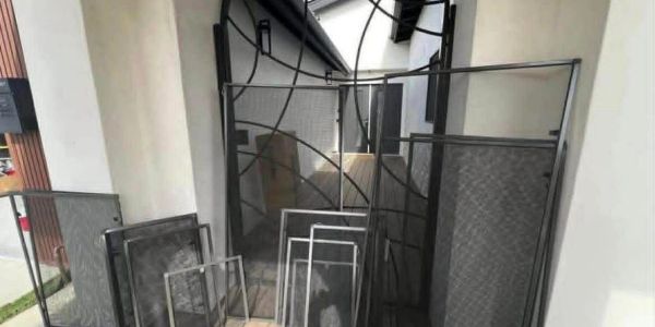 Various metal frames and screens stacked together.