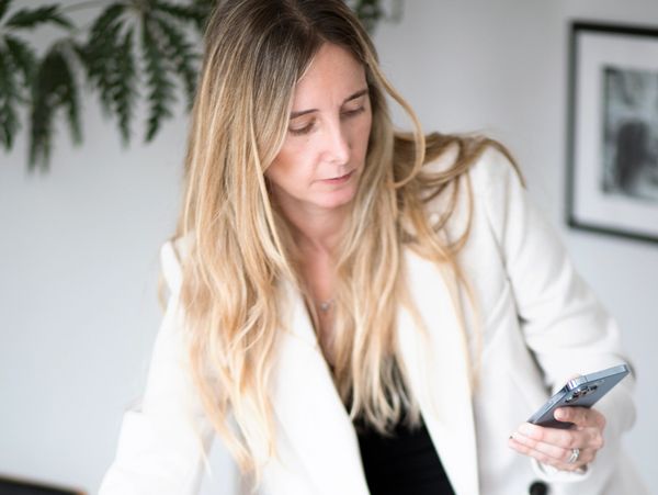 A woman looking on her phone