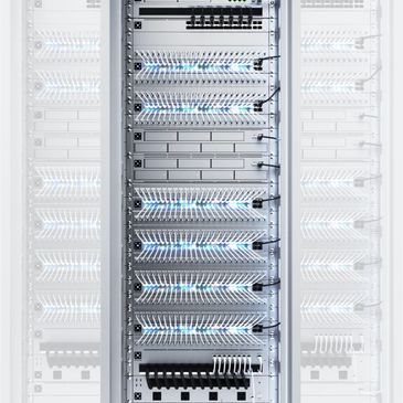 Server rack filled with network equipment and glowing blue lights.