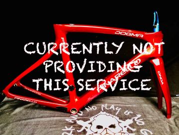 Red bicycle frame with text overlay.