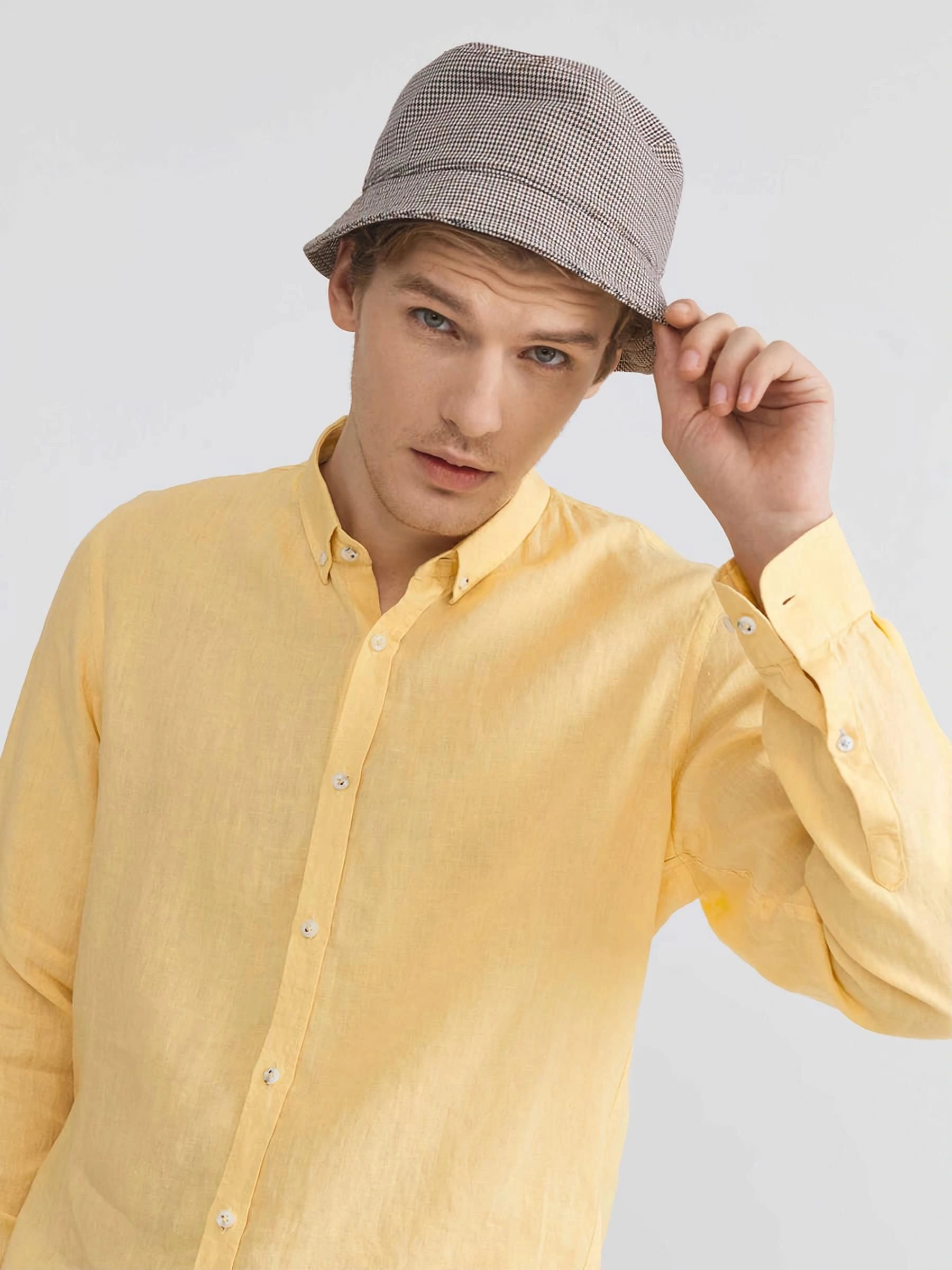 Male model wearing men's linen shirt at XluX menswear.