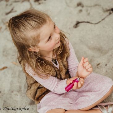 child rolling on essential oils