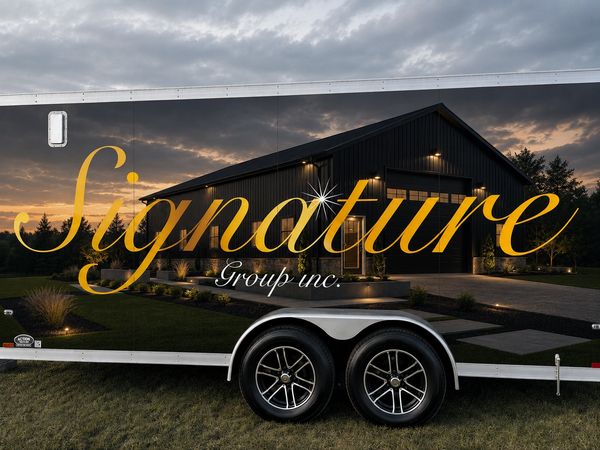 Trailer with Signature Group inc. logo and house image.