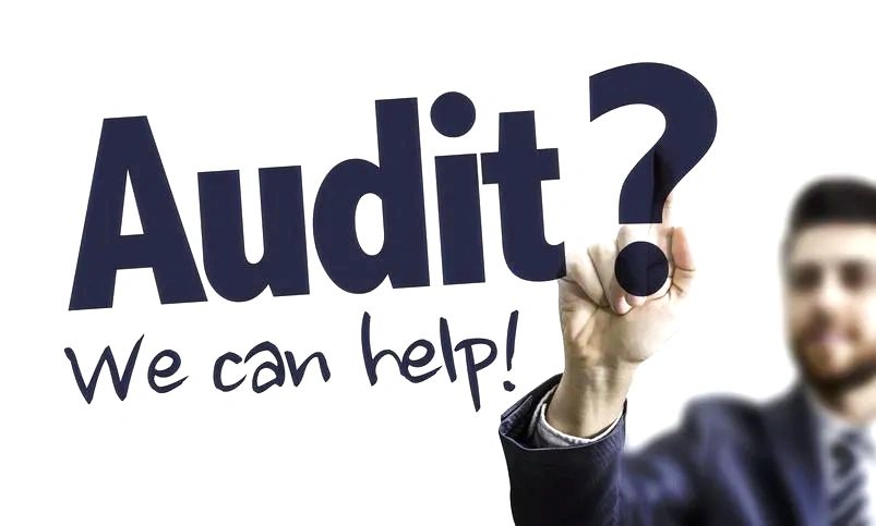 Man pointing at text saying 'Audit? We can help!'