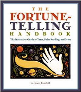 Book titled 'Fortune-Telling Handbook' with a mystical hand and symbols illustration.