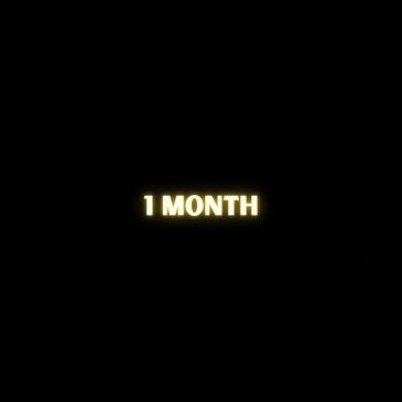 Glowing text reading '1 MONTH' on a black background.