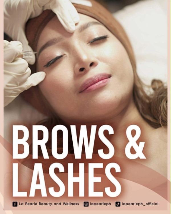 Woman receiving eyebrow treatment.