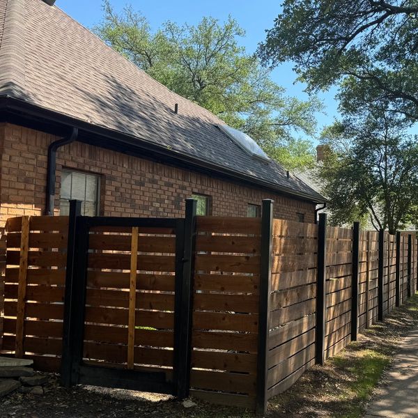  Modern cedar privacy fence installation in DFW by Art Construction Corp