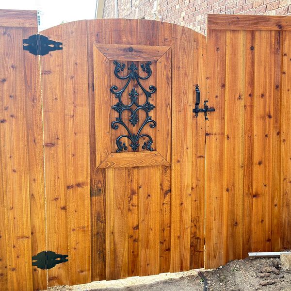    Luxury cedar privacy gate installation in DFW by Art Construction Corp.