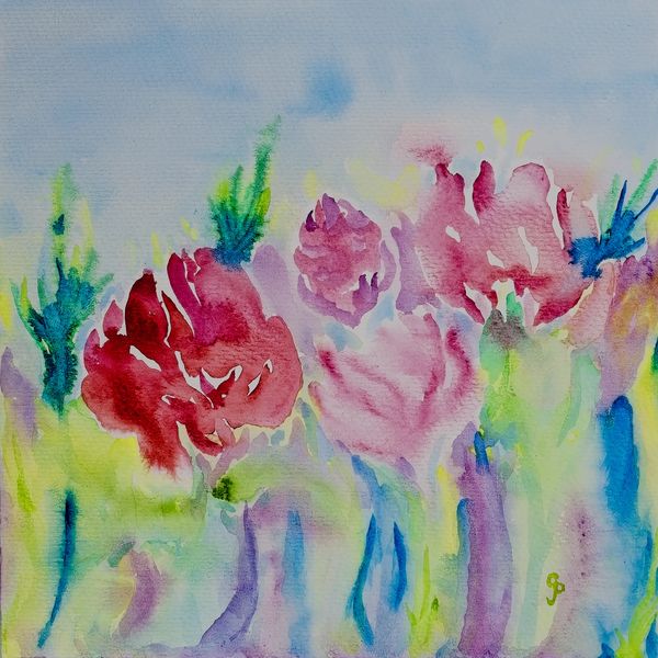 Watercolor painting of multiple flowers in a variety of colors