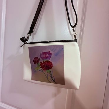 Carnations Crossbody Bag hanging up