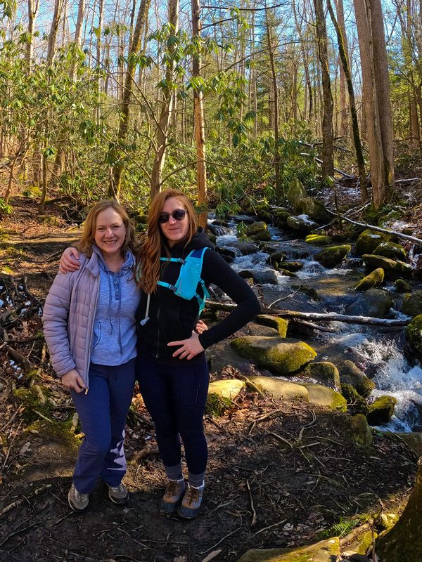 Hikers on hiking trail by a river