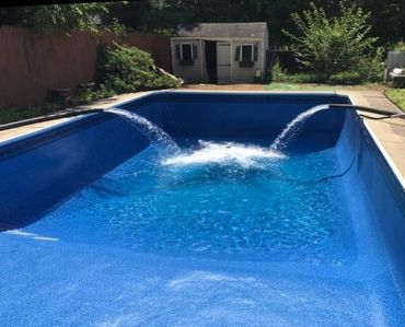 water being filled into a swimming pool