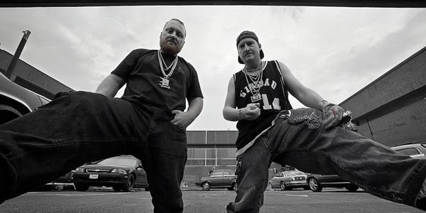 Eric and Jared in baggy jeans and chains circa 1990s crew in the hood LIKE A BOSS