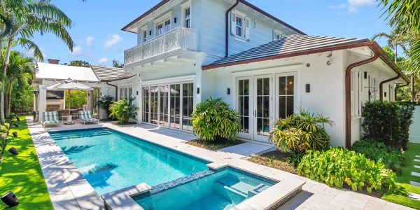 Modern white house with pool and jacuzzi.