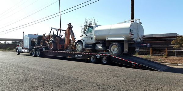 Truck towing equipment and another truck