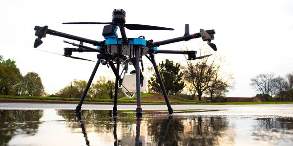 Soft wash cleaning drone