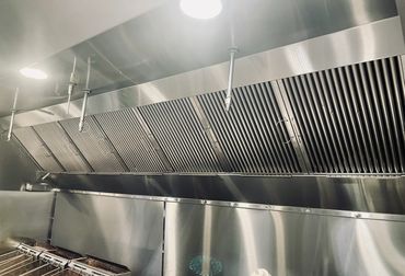 Clean kitchen hood system is fresh and sparkling. Helping you keep your operation safe and clean