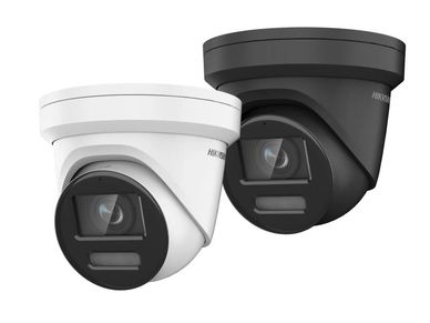 Two modern security cameras, one white and one black, with prominent lenses.