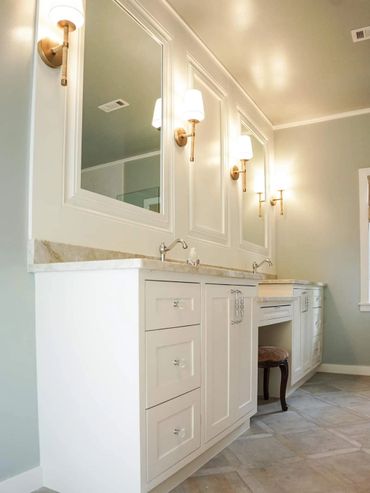 Custom vanity with quartz cpuntertops