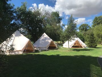 family part with bell tents