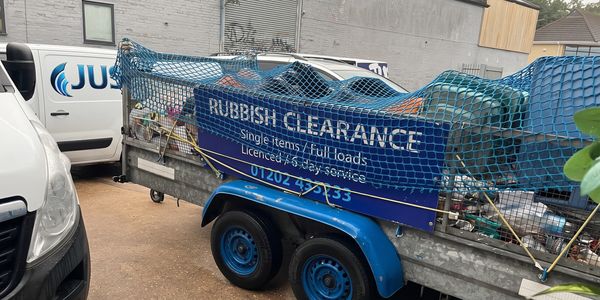 Trailer loaded with rubbish for clearance services.
