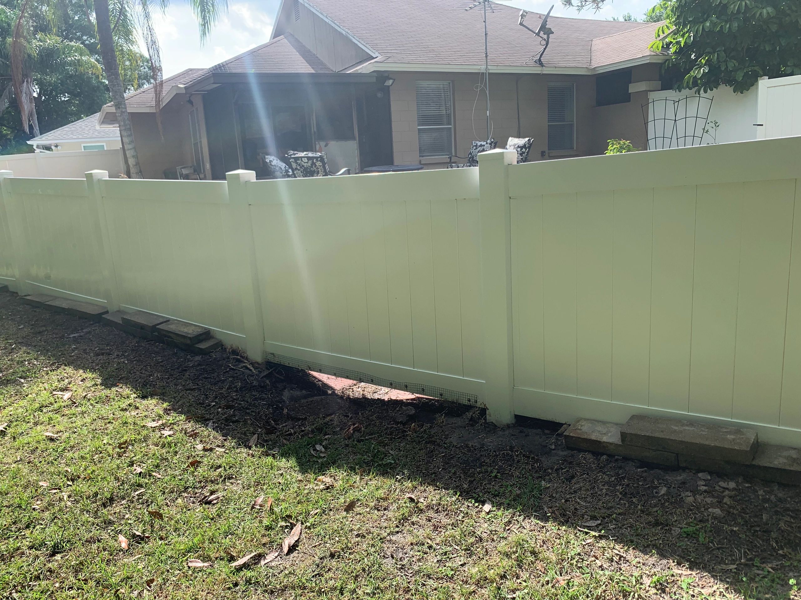 Vinyl fence after pressure washing
