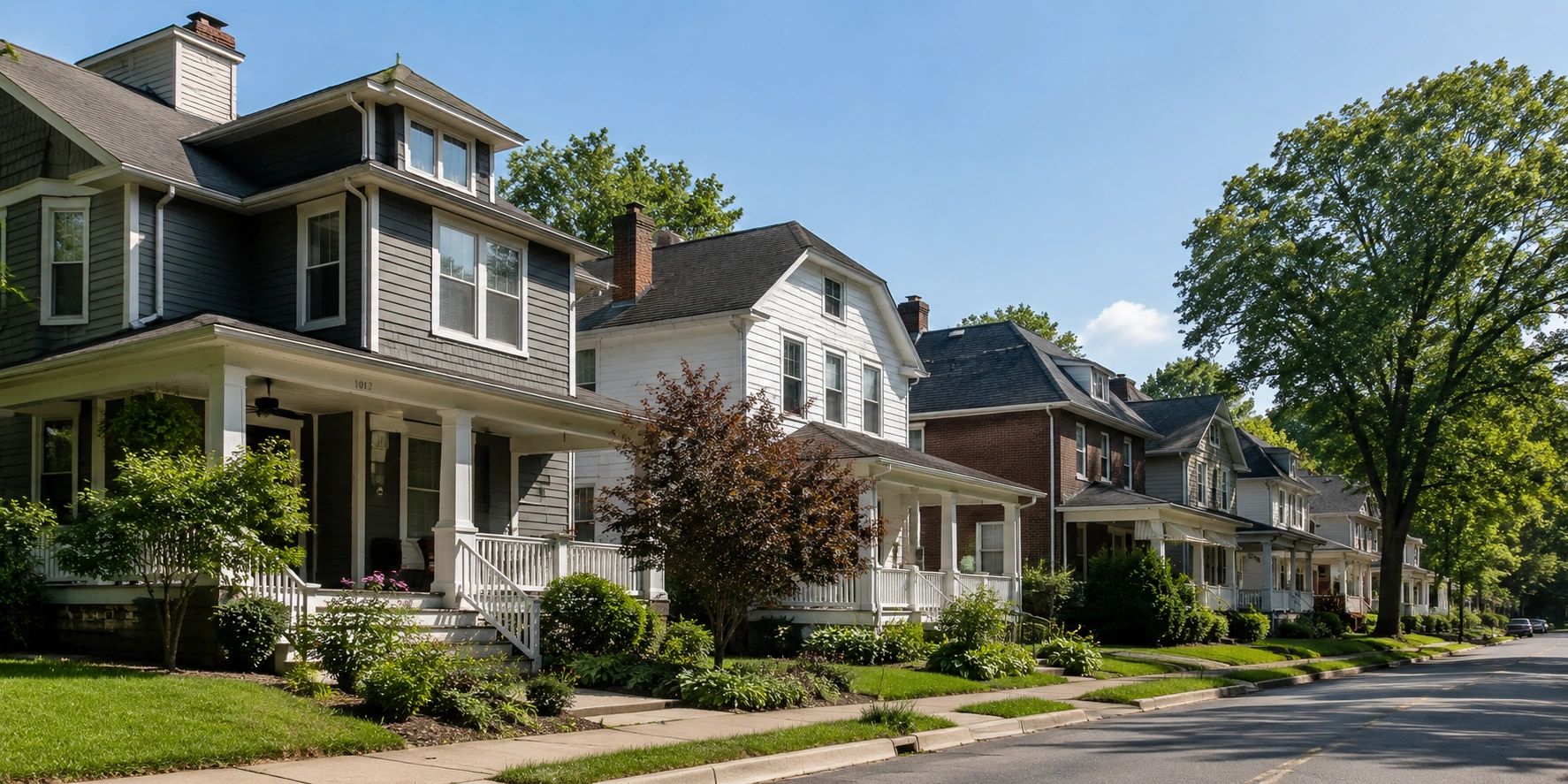 Row of suburban houses on a sunny day.