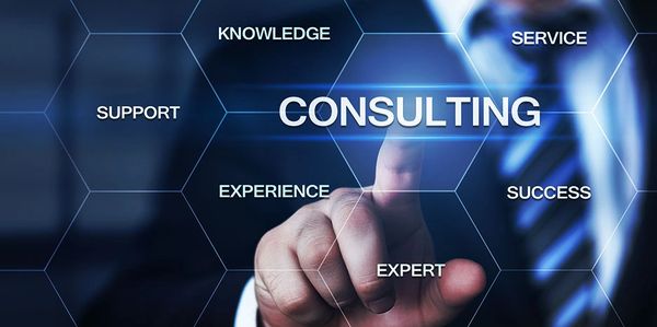 Man pointing to the word 'Consulting' with related keywords.