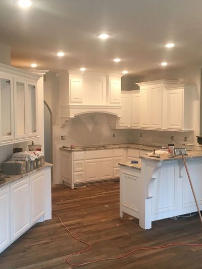 New construction kitchen walls and cabinetry.