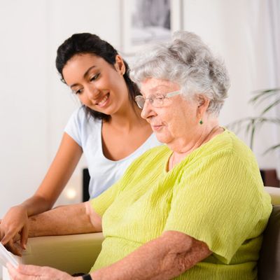 a nurse assisting a patient