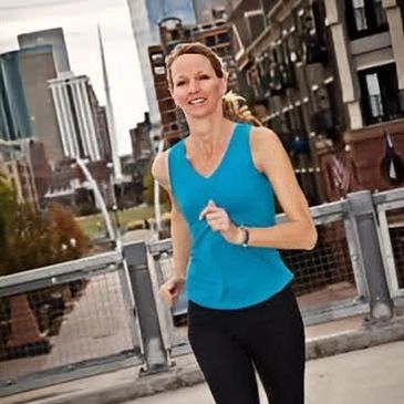 Angela, founder of Wellness Masterminds, running to promote stress resilience and mastery.