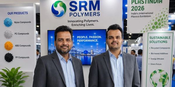Two men posing at SRM Polymers booth.