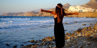 Solo female traveler embracing wanderlust Solo female traveler embracing wanderlust