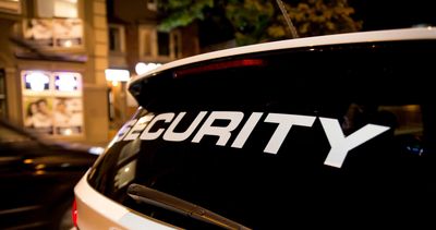 Mobile security patrol vehicle at night