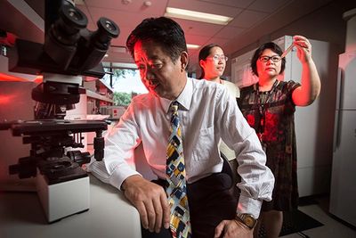 Prof. Xu-Feng Huang in the Lab.