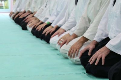 Students formally seated in seiza position