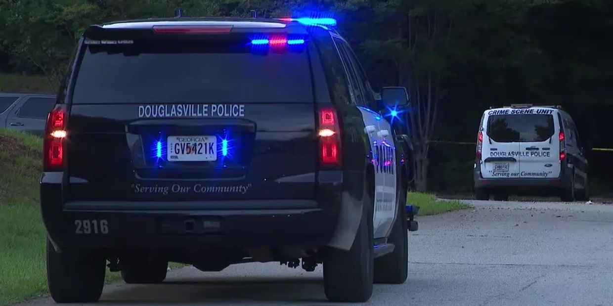 Black police car running on the road