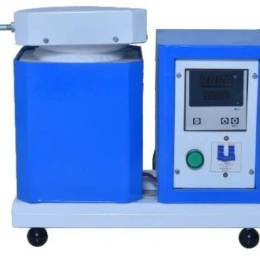 Blue laboratory device with control panel and handle.