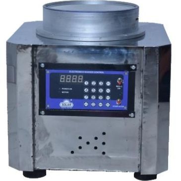 A metallic electronic device with a digital control panel and circular top opening.