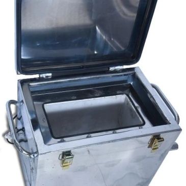 Open portable stainless steel cooler box with handles and latches.
